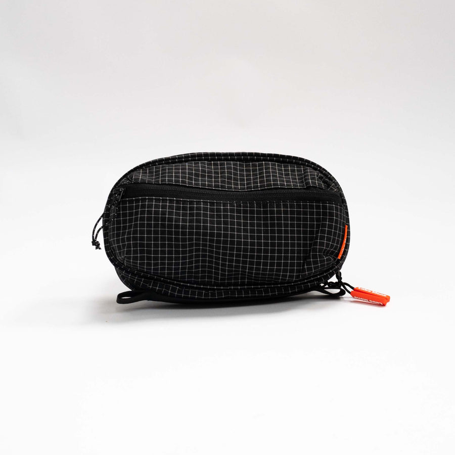 Sling Bag - Medium in Black, front view.