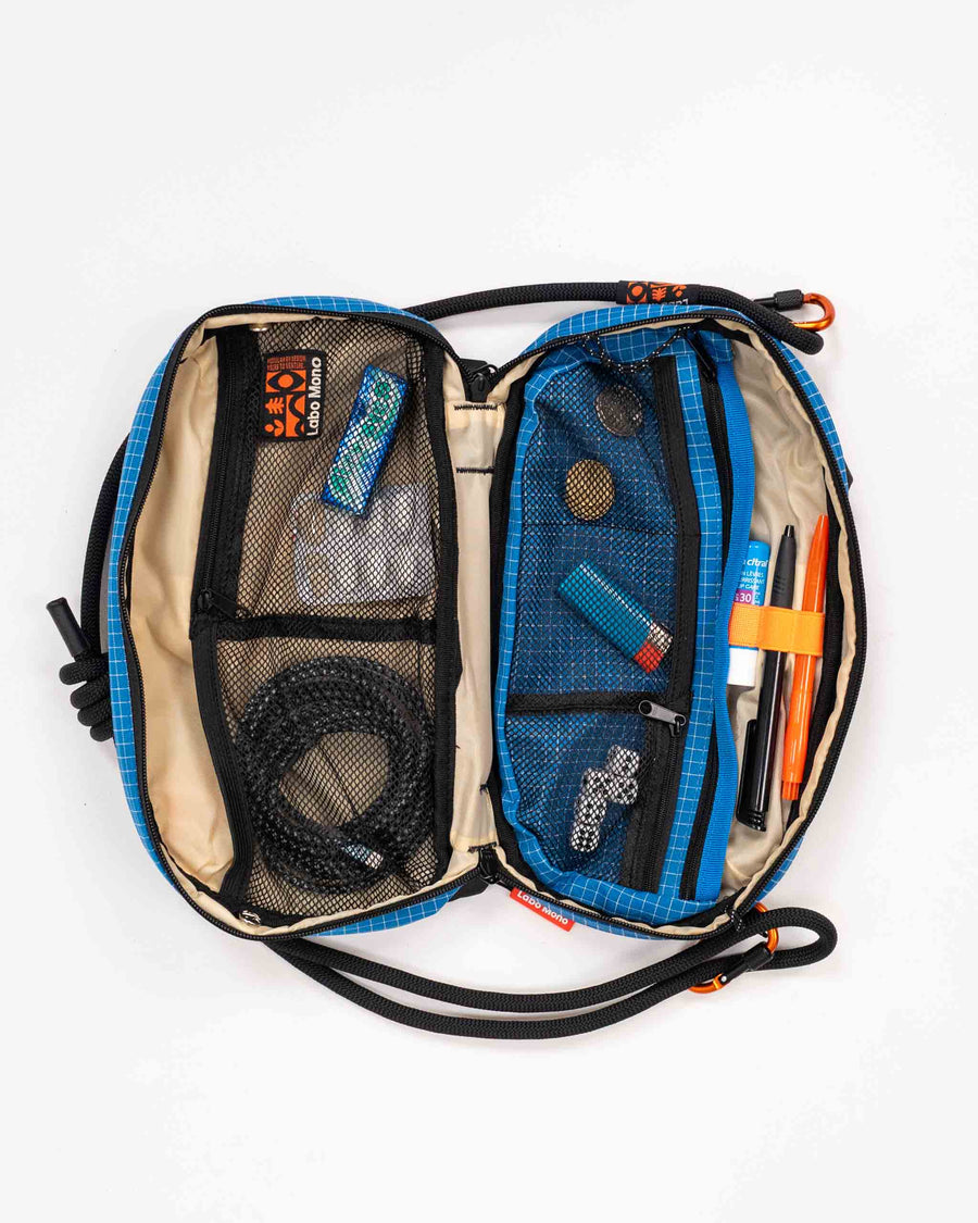 Sling Bag - Large in Blue, fully opened and packed.