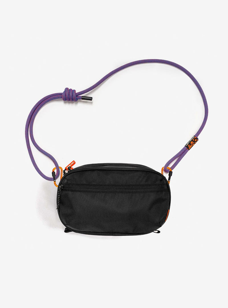 Large sling bag in black with a purple rope strap