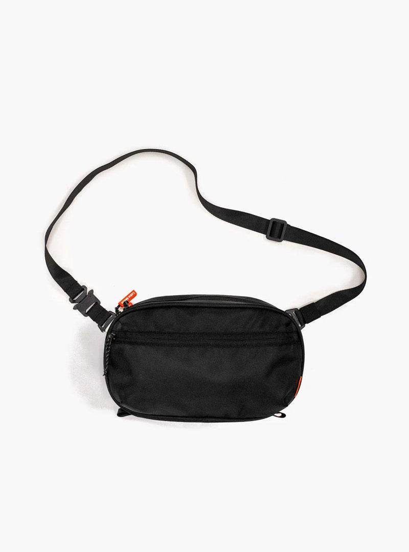 Large sling bag in black with a black flat strap