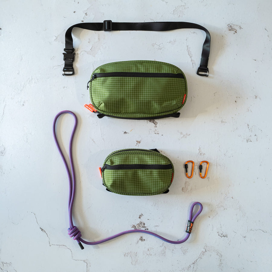 Medium and Large sling bags in Olive, shown with rope and flat strap options.